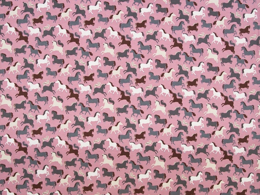 Stoff / Jersey / Baumwolljersey rosa mit Pferden in verschiedenen Farben - 1024-2