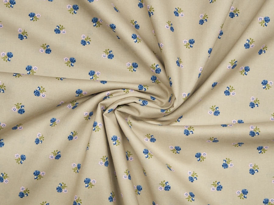 Trachtenstoff sandfarben mit rosa und blauen Blümchen 1002